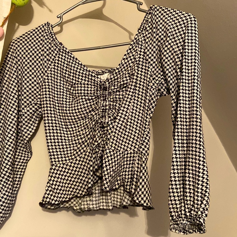 tight on waist, flowy on arms, worn off shoulder or to be worn to you liking!